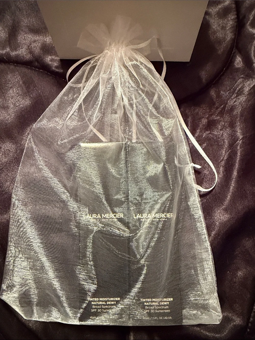laura mercier tind moisturizer natural Dewey. Broad spectrum SPF 30.